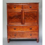 A Victorian mahogany linen press the upper section fitted 2 short drawers above cupboard fitted 3