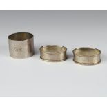 A silver napkin ring Birmingham 1920, 2 others, 55 grams