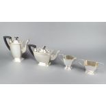 An Art Deco silver plated tea and coffee set comprising teapot, coffee pot, sugar bowl and milk