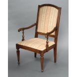 An 18th/19th Century Italian walnut showframe open arm chair, the seat and back upholstered in