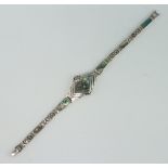 A shell mounted silver bracelet 19cm