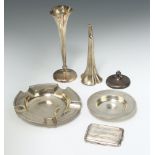 A circular silver ashtray Birmingham 1900, an Armada dish, match holder and 2 spill vases by William