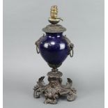 A blue porcelain and spelter table lamp of globular form raised on a Rococo style base 38cm h x 17cm