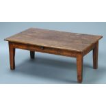 An 18th/19th Century French fruitwood table fitted a drawer (cut down to a coffee table), raised