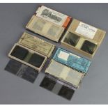 Twelve black and white photographic stereoscopic slides 4.5cm h x 10.5cm w contained in an