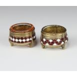 A pair of early 20th Century Russian silver and enamelled circular salts stamped 910.MMET, 5cm diam.