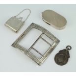 A Victorian silver buckle with bright cut decoration, a silver coin holder, fob and purse, gross