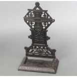 A Victorian pierced cast iron umbrella stand, complete with drip tray 69cm h x 39cm w x 21cm dThe