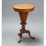 A Victorian inlaid figured walnut work box of conical form, raised on pillar and tripod base 71cm