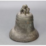 An 18th Century cast bronze turret/church bell of typical form with suspension crown and