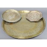 A polished Benares brass tray 24cm w x 23cm, two circular ditto 29cm diam and 58cm diam