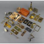 A quantity of various gilt metal microscope component parts