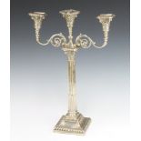 A Victorian silver 3 light candelabrum on Corinthian column with acanthus decorated base Sheffield
