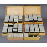 Three wooden boxes containing various colour and black and white photographic slides of Kent, Rye,