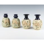 A pair of Langley ovoid vases with incised floral decoration 14cm, a similar pair with flared