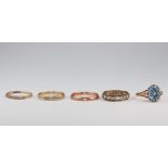 Four 9ct yellow gold rings and a ditto topaz ring, all size M, 8 grams gross