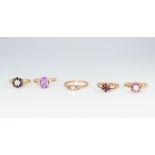 Five 9ct yellow gold gem set rings, all size O, 8 grams