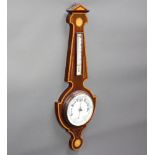 An Edwardian aneroid barometer and thermometer with enamelled dial, contained in an inlaid