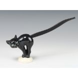 A Goebels black cat pretzel holder with black wooden tail 10cm