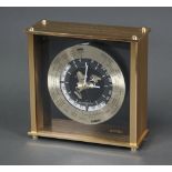 A Seiko World Time Zone battery operated clock, contained in a gilt case 20cm x 21cm x 8cm,