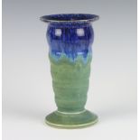 A Langley Art Deco ribbed tapered vase with slip glazed decoration 20cm