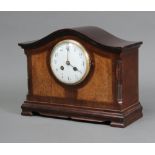 An Edwardian French 8 day striking mantel clock with enamelled dial and Roman numerals contained