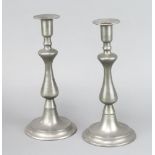 A pair of 19th Century baluster shaped pewter candlesticks 29cm h x 13cm w