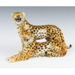 An Italian porcelain group of 2 leopards 25cm