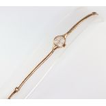 A ladys Rotary 9ct yellow gold wristwatch and strap 10 grams including glass