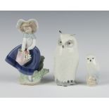 A Royal Copenhagen figure of an owl no.55, 16cm, a ditto of a baby owl 8.5cm and a Lladro figure