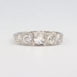 A white metal stamped Plat graduated 5 stone diamond ring 0.9ct, size N, 4 grams