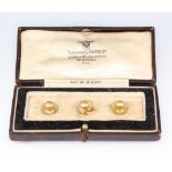 Three 9ct yellow gold studs and a clasp 1.9 grams