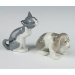 A Lladro figure of a seated cat 5113 14cm, a ditto of a hound 7cm