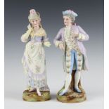 A pair of 19th Century German bisque figures of a lady and gentleman 34cm