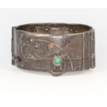 Gisela Seibert-Philippen, a stylish grey metal repousse bracelet decorated with a pig, a bull, trees