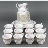 A Richmond Rose Time pattern part tea set comprising 12 tea cups, milk jug, sugar bowl, 12