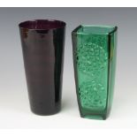 A Whitefriars style green glass vase with moulded circular decoration 22cm together with a red glass