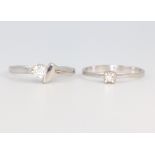 An 18ct white gold single stone diamond ring 0.3ct, size J Â½, together with a ditto size K 1/2, 1.4