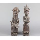 A pair of Benin bronze figures of seated ladies 35cm h x 7cm w x 9cm d