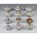 Twelve Kyoto Victoria and Albert Museum miniature model teapots