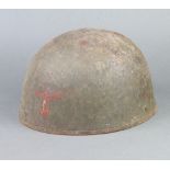 A Second World War steel helmet complete with liner This helmet has some surface corrosion