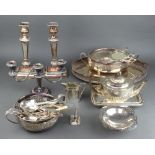 An oval pierced galleried tray 40cm, a pair of tapered candlesticks and minor plated wares