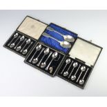 A cased set of silver coffee spoons London 1938, a ditto of 6 coffee spoons and 5 teaspoons together