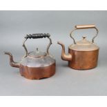 A Victorian oval copper kettle 22cm x 16cm x 14cm, a circular copper kettle with ebonised handle