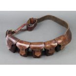 Barrow Hepburn & Gale of London, a leather cartridge bandolier marked Barrow Hepburn & Gale 1922