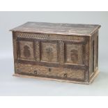 A 17th/18th Century carved oak mule chest with hinged lid, the base fitted a drawer 66cm h x 113cm w