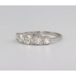 A white metal stamped Plat. graduated 5 stone diamond ring approx. 0.85ct, 3.6 grams, size O