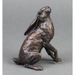 In the manner of Richard Cooper & Co., a limited edition bronze figure of a seated hare marked IF