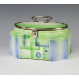 A 1930's Continental shaped green and blue glazed pottery biscuit barrel and cover with chrome