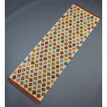 A white, tan and green ground Chobi kilim runner with all over geometric designs 198cm x 63cm